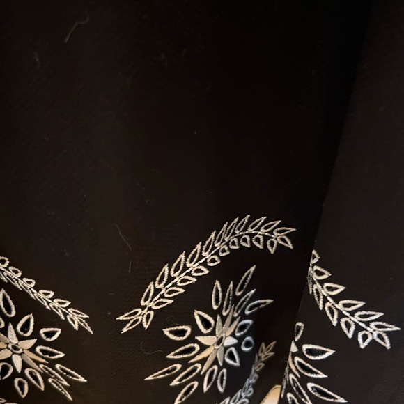 Jessica Howard Black Midi Dress with White Embroidery at neck and bottom hem. - Picture 2 of 6